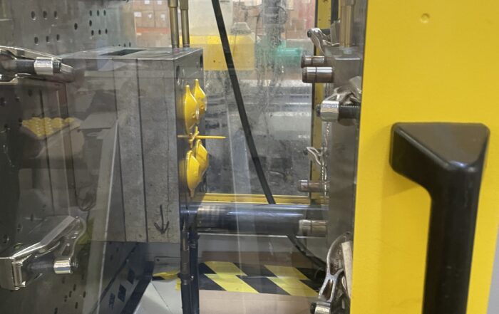 Injection Moulded parts on machine